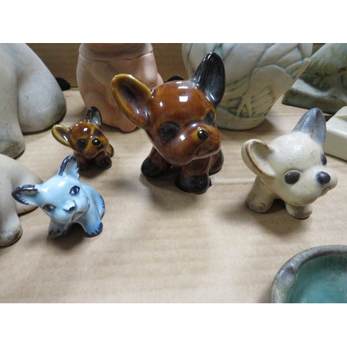 127 - A tray of assorted animal figures to include a Denby Pelican etc