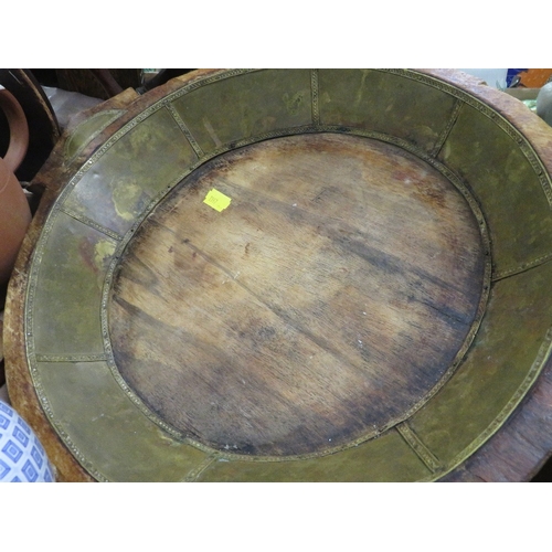 128 - A tray of assorted ceramics and collectables to include a continental wooden bowl with interior meta... 