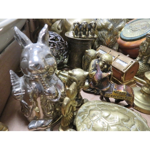 134 - A tray of assorted metal ware to include a model of a beefeater
