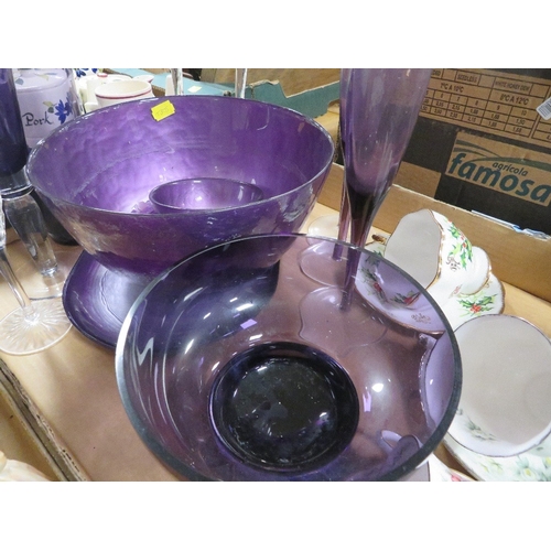 150 - A tray of assorted purple glass ware and ceramics