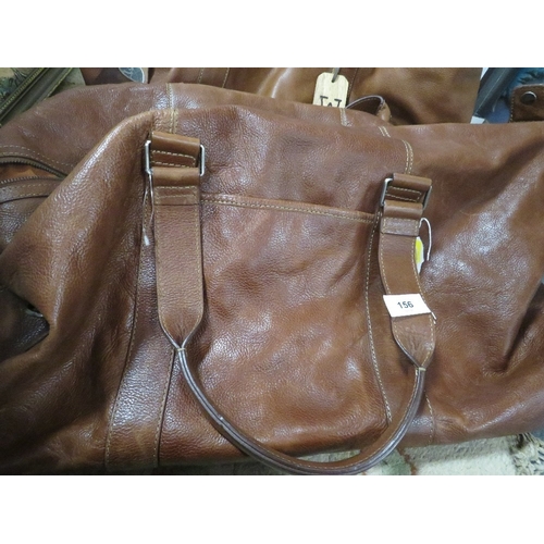 156 - Two vintage leather travel bags
