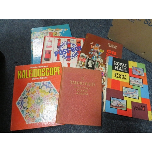 190 - A tray of 30+ stamp albums