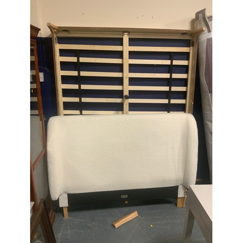 709 - A modern double bed frame - slight damage to one foot W 150 cm