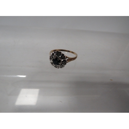 A hallmarked 9 carat gold sapphire and diamond ring approx weight 2.1g