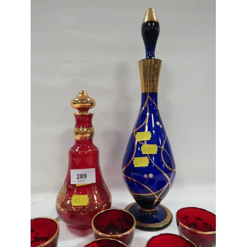 A Murano six glass and decanter set with gold overlay depicting scenes ...