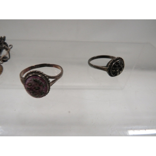 A hallmarked silver inlay trinket box and contents to include a silver ring