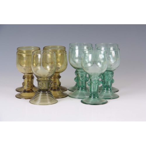 12 - A SET OF FIVE CONTINENTAL PALE AMBER WINE GLASSES with prunted stems and ribbed bases together with ... 