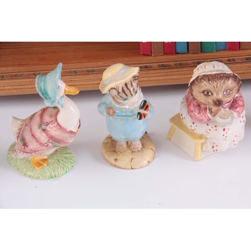 121 - A COLLECTION OF 7 BEATRIX POTTER FIGURINES, 3 Beswick, 3 Royal Doulton and 1 royal Albert tallest be... 