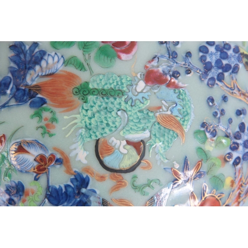 133 - A CHINESE PORCELAIN FAMILLE ROSE JARDINIéRE depicting butterflies and animals on a celadon ground.