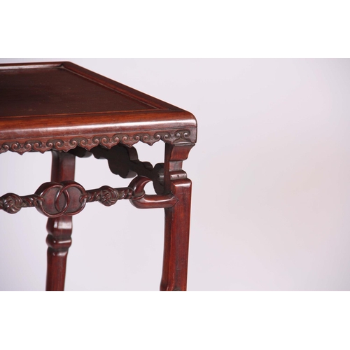 134 - A 19TH CENTURY CHINESE HARDWOOD JARDINIERE STAND