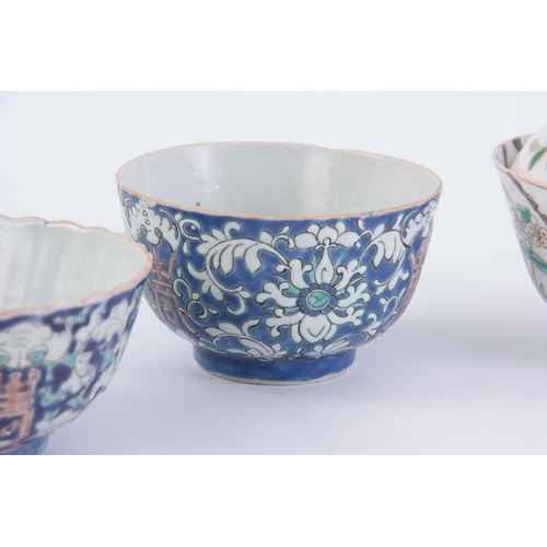 135 - A COLLECTION OF SMALL CHINESE PORCELAIN BOWLS one with lid, ranging from 5cm high to 7cm high