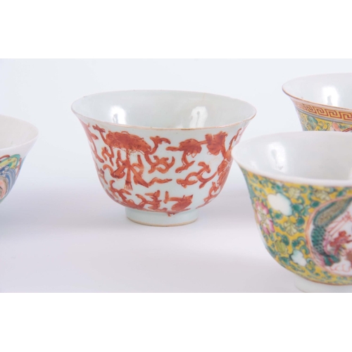 135 - A COLLECTION OF SMALL CHINESE PORCELAIN BOWLS one with lid, ranging from 5cm high to 7cm high