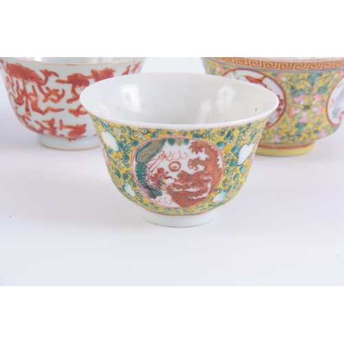 135 - A COLLECTION OF SMALL CHINESE PORCELAIN BOWLS one with lid, ranging from 5cm high to 7cm high