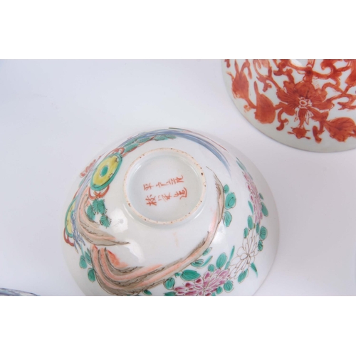 135 - A COLLECTION OF SMALL CHINESE PORCELAIN BOWLS one with lid, ranging from 5cm high to 7cm high