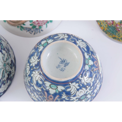 135 - A COLLECTION OF SMALL CHINESE PORCELAIN BOWLS one with lid, ranging from 5cm high to 7cm high