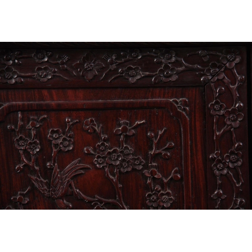 137 - AN IMPRESSIVE 19TH CENTURY CHINESE HARDWOOD DISPLAY CABINET having elaborately carved dragon pedimen... 