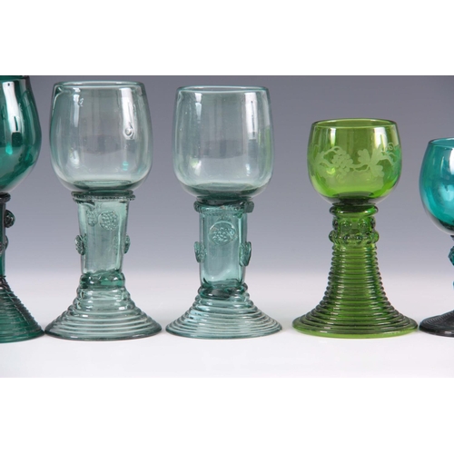 14 - A GROUP OF THREE 19TH CENTURY GREEN GLASS RUMMERS with rounded bowls on prunted flared ribbed bases ... 