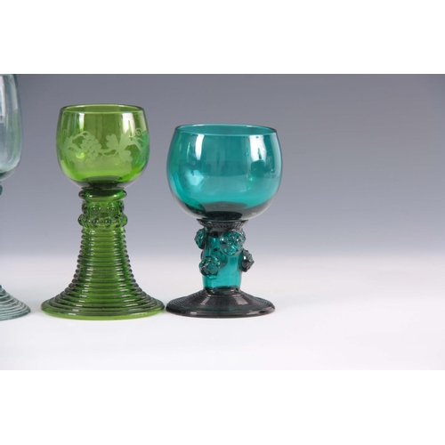 14 - A GROUP OF THREE 19TH CENTURY GREEN GLASS RUMMERS with rounded bowls on prunted flared ribbed bases ... 