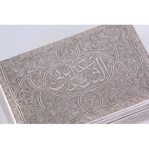 140 - AN EARLY 20TH CENTURY ISLAMIC SILVER CIGARETTE BOX decorated with chased Islamic script and floral m... 