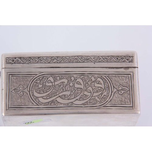 140 - AN EARLY 20TH CENTURY ISLAMIC SILVER CIGARETTE BOX decorated with chased Islamic script and floral m... 