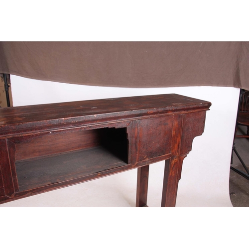 143 - AN 18TH CENTURY CHINESE STAINED HARDWOOD ALTAR TABLE with open frieze panel to the front; standing o... 