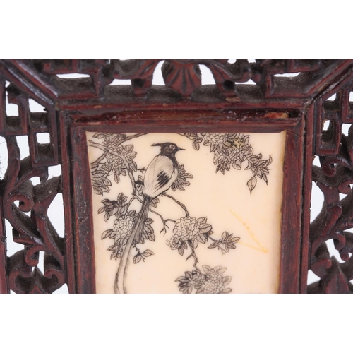 163 - LATE 19th CENTURY ORIENTAL TABLE SCREEN having a pierced rosewood frame enclosing an engraved ivory ... 