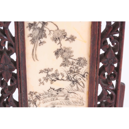 163 - LATE 19th CENTURY ORIENTAL TABLE SCREEN having a pierced rosewood frame enclosing an engraved ivory ... 