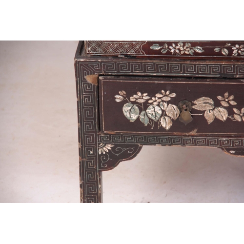 164 - AN EARLY 20TH CENTURY CHINOISERIE DECORATED LAQUERED CABINET having three sections the top two with ... 