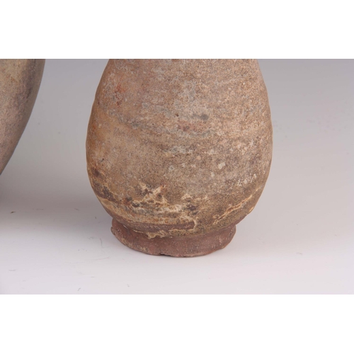 170 - THREE ANTIQUE CHINESE UNGLAZED STONEWARE VASES one of spherical shape 20cm, another ovoid with two s... 