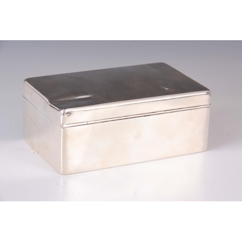 186 - AN EARLY 20TH CENTURY SILVER CIGAR BOX with lined decoration to the top 14cm wide 9cm deep 6cm high.