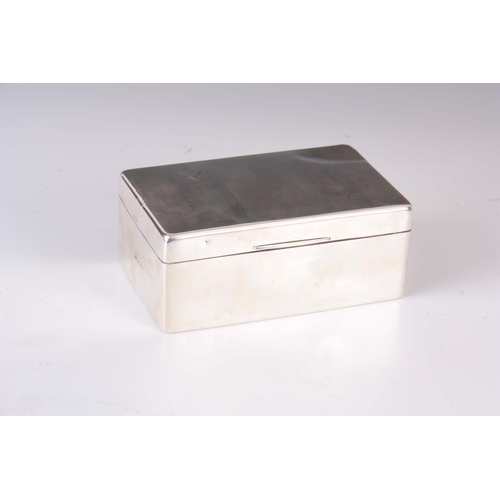 186 - AN EARLY 20TH CENTURY SILVER CIGAR BOX with lined decoration to the top 14cm wide 9cm deep 6cm high.