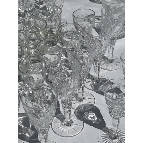 2 - A LARGE COLLECTION OF 20TH CENTURY DRINKING GLASSES including a set of ten baccarat style vine flute... 