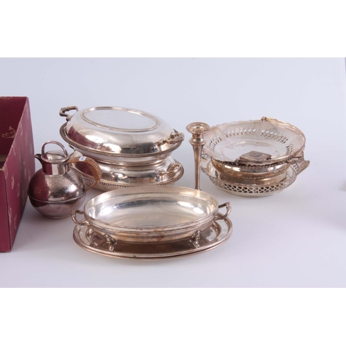 200 - A BOXED LOT OF SILVER PLATED WARE AND CUTLERY including 2 lidded tureens, a cake basket, and jersey ... 