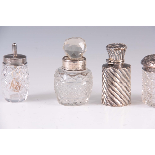 216 - A SELECTION OF 3 CUT GLASS AND SILVER BOTTLES and a silver scent bottle ( 4 )