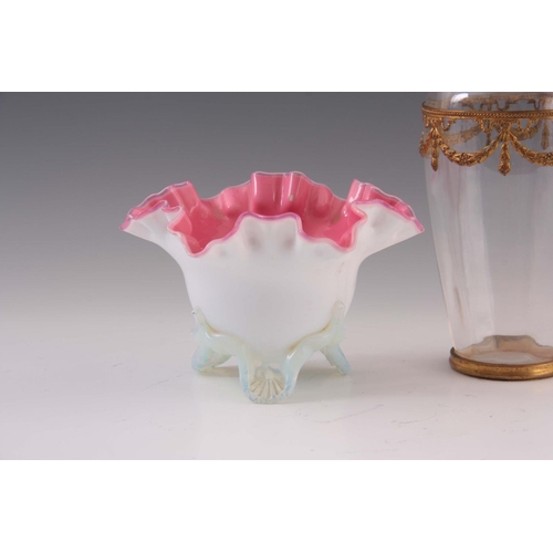 28 - A 19TH CENTURY PINK LINED OPALINE GLASS VASE standing on a shell moulded tripod base, 11cm high, 17c... 