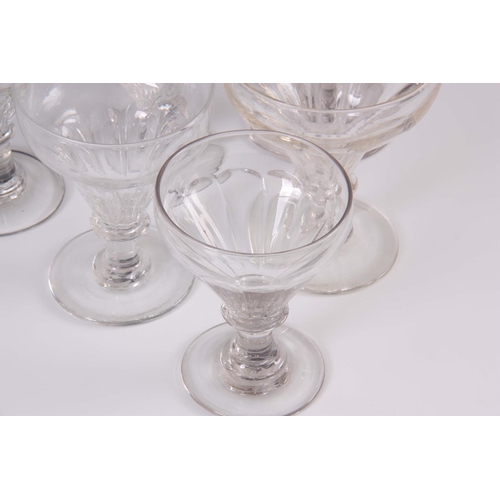 3 - A PAIR OF 19TH CENTURY GIANT SIZE WINE GLASSES/RUMMERS with tapered rounded fluted bowls on blade kn... 