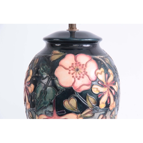 35 - A 20TH CENTURY MOORCROFT POTTERY LAMP BASE decorated with Oberon design 46cm.