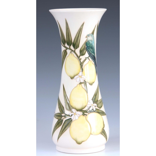 39 - A LATE 20TH CENTURY MOORCROFT POTTERY VASE decorated with lemons and birds on a cream ground, signed... 