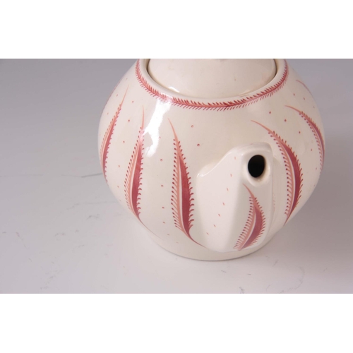 46 - A LATE 20TH CENTURY WEDGWOOD SUSIE COOPER TEAPOT, red fern pattern, 12cm high, 18cm wide.