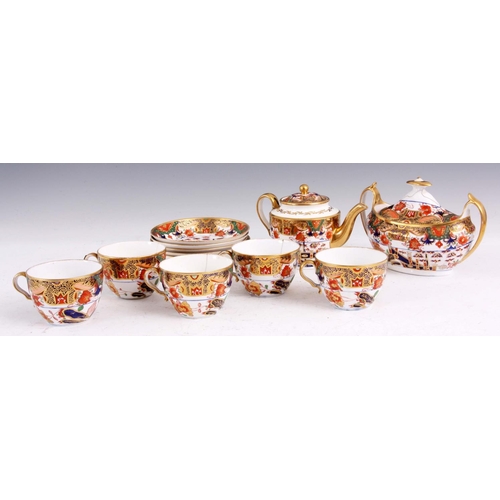 50 - AN EARLY 19TH CENTURY SPODE TYPE PORCELAIN PART TEA SERVICE comprising teapot, oval two handled lidd... 