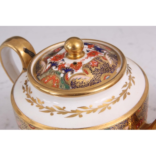 50 - AN EARLY 19TH CENTURY SPODE TYPE PORCELAIN PART TEA SERVICE comprising teapot, oval two handled lidd... 