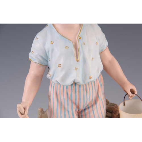 53 - A 19TH CENTURY LARGE PAIR OF BISQUE PORCELAIN FIGURES OF A BOY AND GIRL at the seaside each carrying... 