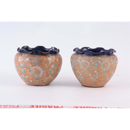 59 - A PAIR OF ROYAL DOULTON STONEWARE JARDINIERES decorated with flower sprays 18cm high AND ANOTHER ROY... 