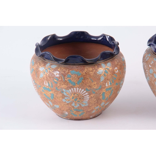 59 - A PAIR OF ROYAL DOULTON STONEWARE JARDINIERES decorated with flower sprays 18cm high AND ANOTHER ROY... 