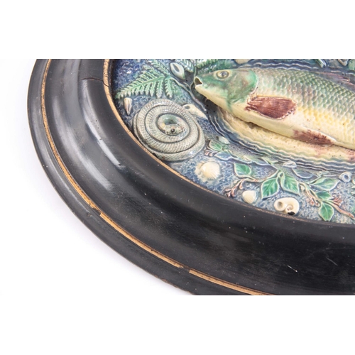 71 - A 19TH CENTURY FRENCH RENOLEAU PALISSY MAJOLICA OVAL FISH PLATTER with relief moulded trout having a... 