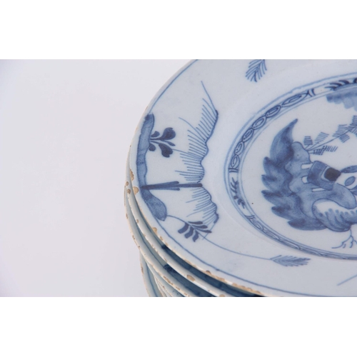 76 - A SET OF TWELVE 18TH CENTURY BLUE AND WHITE DELFT PLATES decorated with pagoda in a garden scene 23c... 