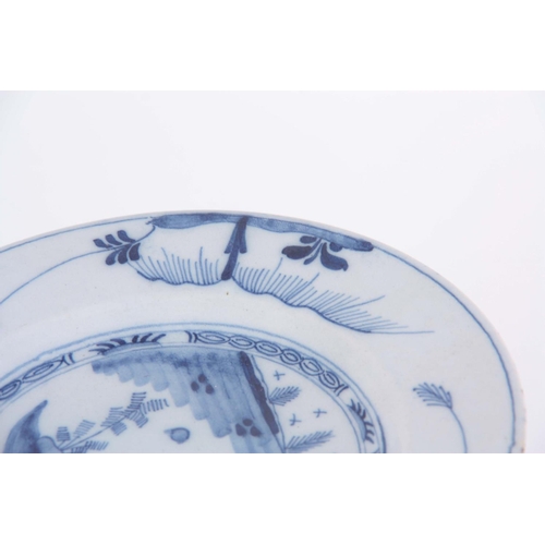 76 - A SET OF TWELVE 18TH CENTURY BLUE AND WHITE DELFT PLATES decorated with pagoda in a garden scene 23c... 