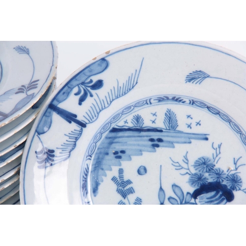 76 - A SET OF TWELVE 18TH CENTURY BLUE AND WHITE DELFT PLATES decorated with pagoda in a garden scene 23c... 