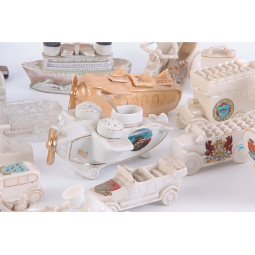 82 - A COLLECTION OF 13 CRESTED CHINA WARE ITEMS, including 2 motorcycle riders, a ww1 tank, petrol can a... 