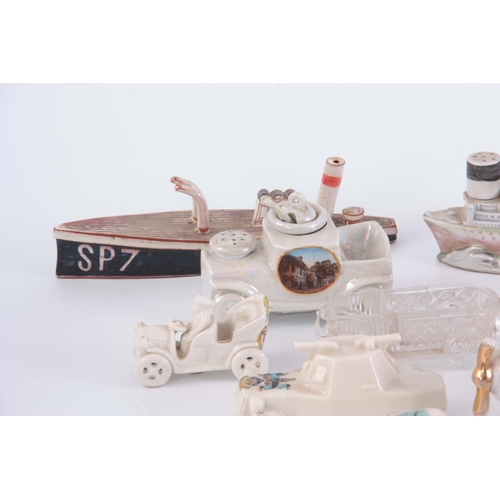 82 - A COLLECTION OF 13 CRESTED CHINA WARE ITEMS, including 2 motorcycle riders, a ww1 tank, petrol can a... 